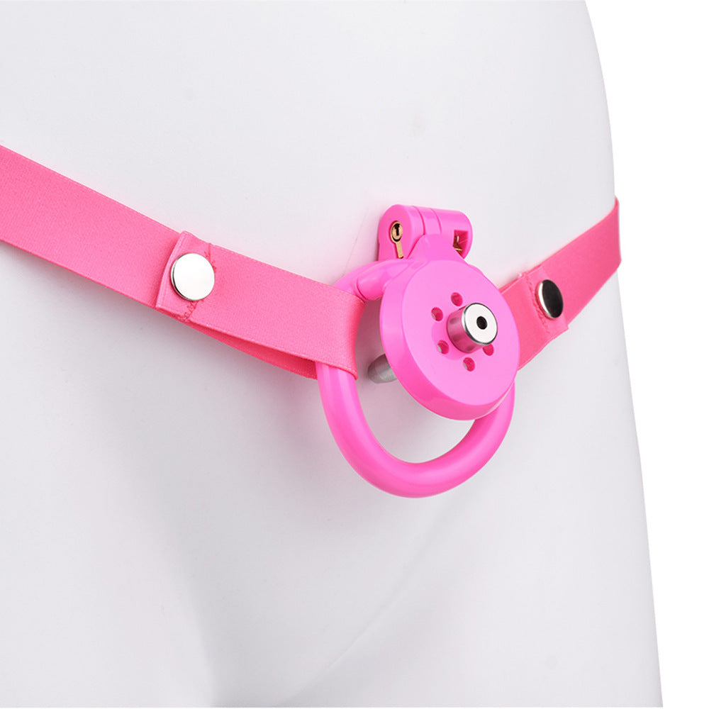 tiny pink flat chastity cage for sissy ladyboy with strap and metal catheter tube