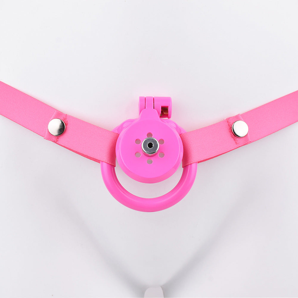 tiny pink flat chastity cage for sissy ladyboy with strap and metal catheter tube
