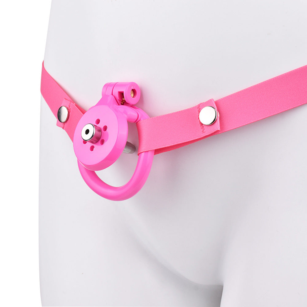 tiny pink flat chastity cage for sissy ladyboy with strap and metal catheter tube