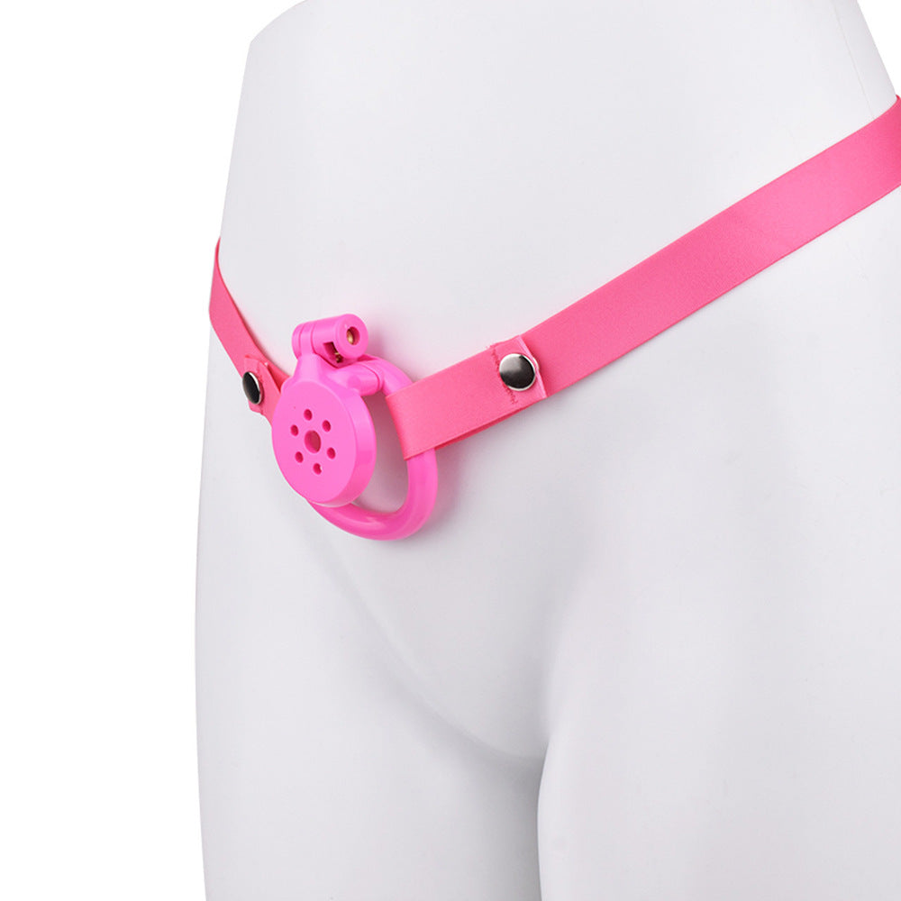 tiny pink flat chastity cage for sissy ladyboy with strap and metal catheter tube