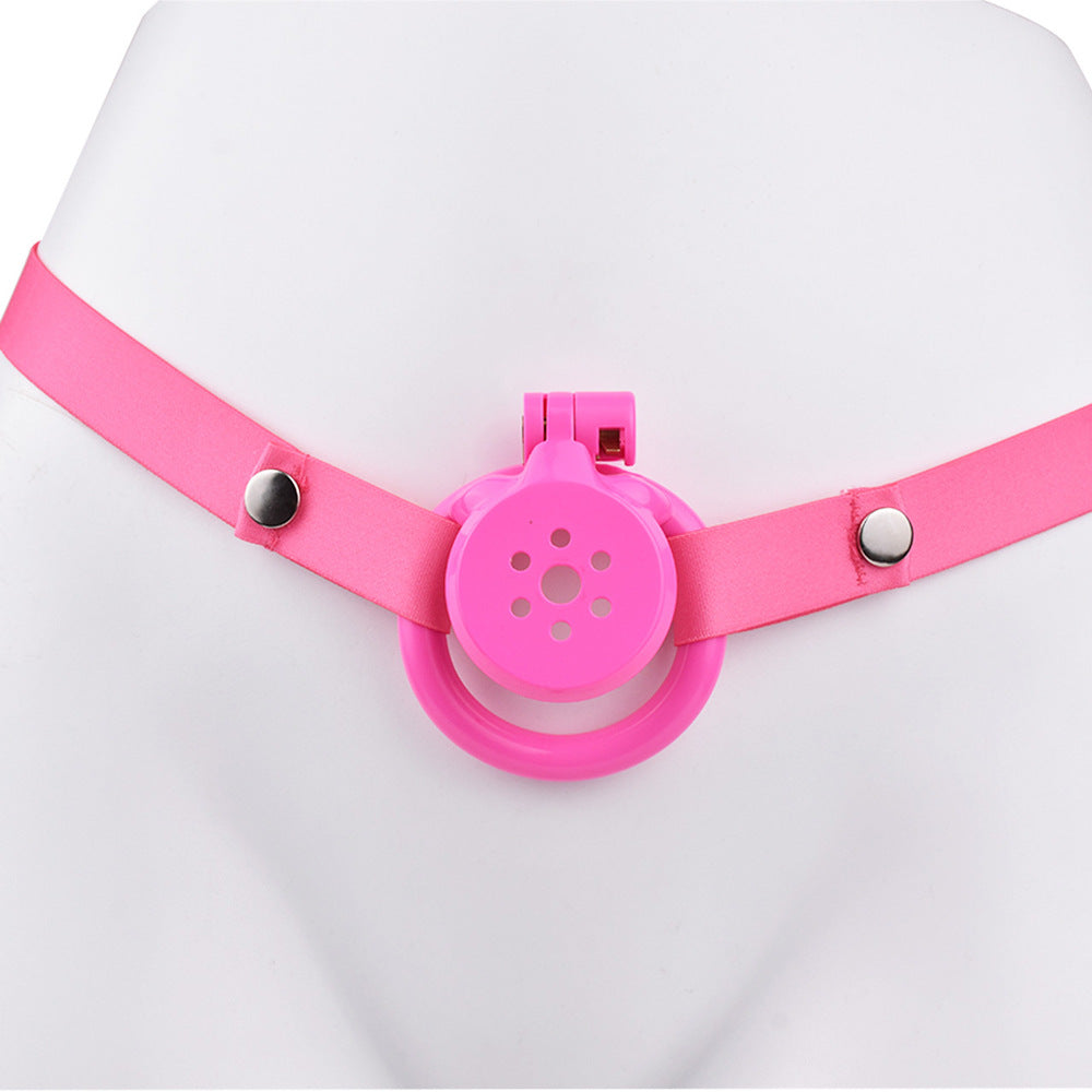 tiny pink flat chastity cage for sissy ladyboy with strap and metal catheter tube